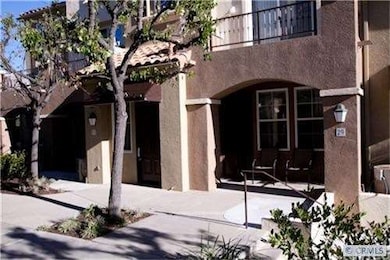 Your front door opens into a courtyard that is met