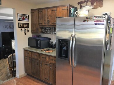 A separate counter area with glass rack allows for