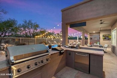 Outdoor kitchen w/ griddle & fridge