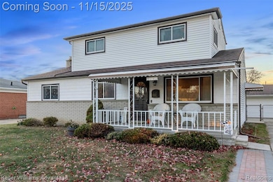 View of front of house featuring covered porch, brick siding, a shingled roof, and a front yard