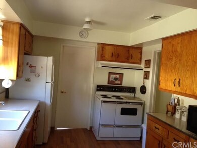 THE DOOR LEADS TO THE LAUNDRY ROOM AND GUEST BATHR