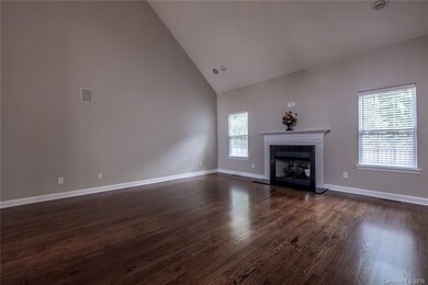 Great Room--hardwoods, half-vaulted ceiling, firep