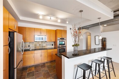 Stainless steel appliances with ample cabinet spac
