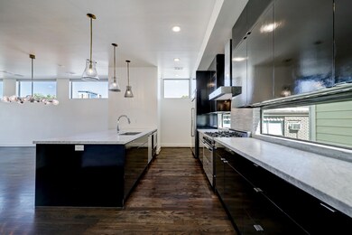 The Kitchen features 42 inch hand painted cabinets