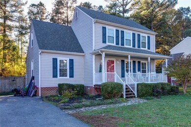 Double width paved driveway to full front porch an