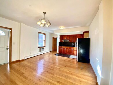 Kitchen featuring light wood-style flooring, under
