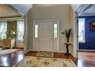 Beautiful 2-story foyer with beautiful hardwood fl