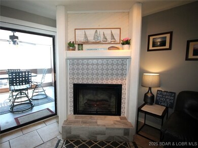 Beautifully tiled electric fireplace.
