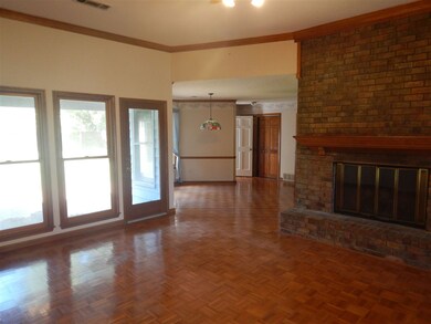 Looking toward Breakfast Room; Covered Rear Patio 