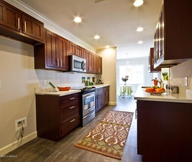 Kitchen towards adjacent Dining