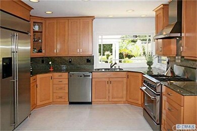 Remodeled gourmet kitchen with granite countertops