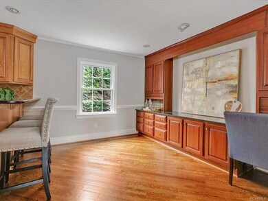 Kitchen with work station/ butler's pantry.
