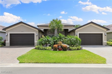 Single story home featuring stucco siding, decorat