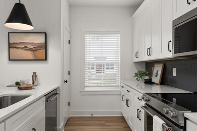 Photos are of a staged a model and not actual home. Design selections vary.