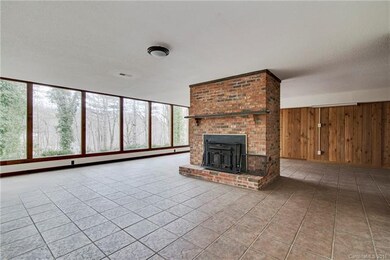 Ground level family room with a cozy woodstove!