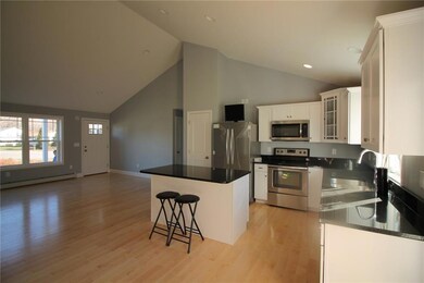Open concept kitchen and living area.