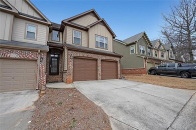 View of front of property with a garage