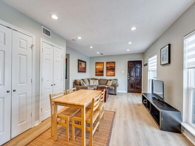 Dining area with light wood-type flooring
