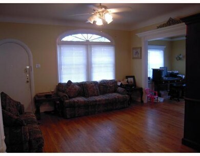 Living Room. Beautiful hardwood floor with 9 foot ceilings