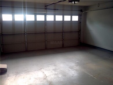 Rear-loaded two car garage! There a Storage Room i