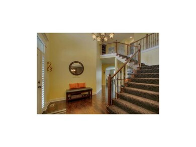 Wide Open Stair Case with designer carpet and iron
