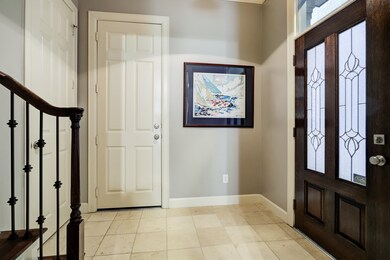 Entry foyer with marble floors.