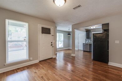 Open the front door to newly finished floors, and updates throughout.