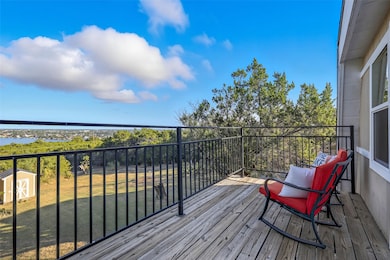 Deck with a storage unit and a water view