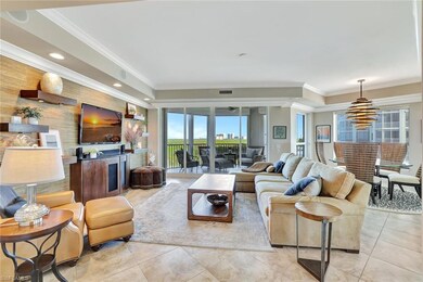 Living room with detailed Crown molding, recessed 