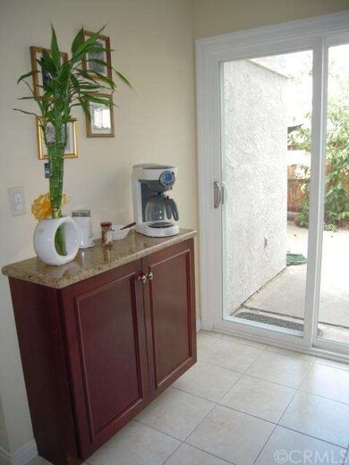 The kitchen also features a stand alone cabinet wi