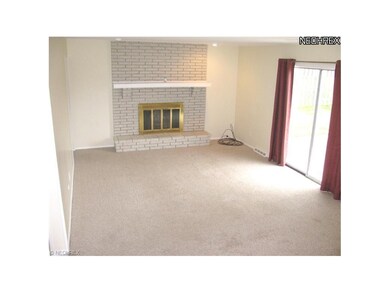 Family room with wood burning fireplace