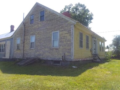 0321 back side of home needs paint