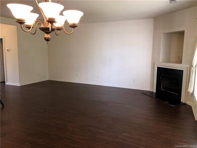 Open lower level with vinyl hardwood flooring.