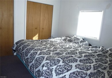 The master bedroom fits two beds.