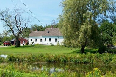 Front with farm/fire pond and...