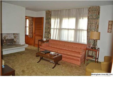 Living Room on the main level w/ Fire place that h