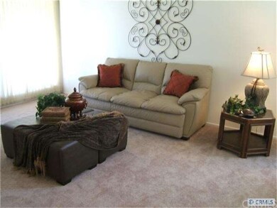 Living room with lots of light from huge picture w