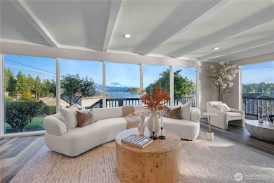 Upstairs main living room with lake views and open concept designWalk
