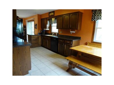 . Kitchen has ceramic tile flooring and new counte