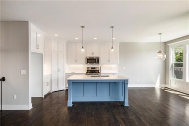 1304 SW Sapperton Rd, Raymore, MO 64083 - photo 4