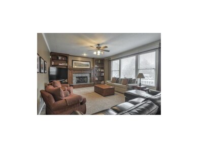 Enjoy the spacious Family Room with beautiful fire