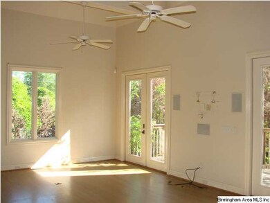 Fabulous great room with high ceilings, lots of li