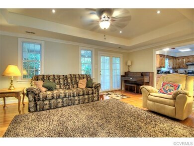 View of Family Room with French Doors to screened 