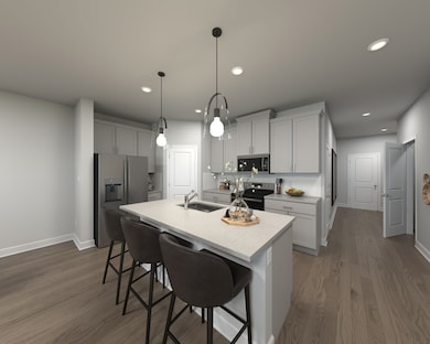 Photo is not of the actual home, but is an inspirational photo of builder’s model home and may depict options, furnishings, and/or decorator features that are not included