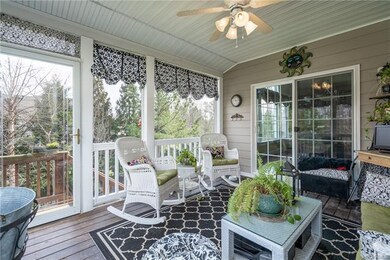 A wonderfully large screened in porch right off of the morning room is the perfect place to enjoy that morning cup of coffee or late night glass of wine!