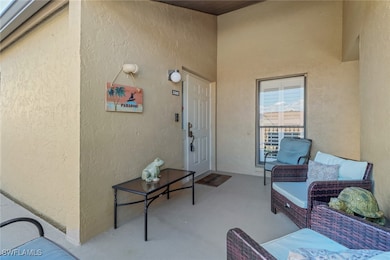 Doorway to property with an outdoor hangout area a
