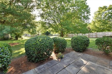 Well manicured patio and yard area