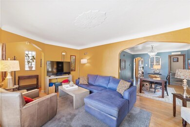 Archways add glass block windows add character to this open floor plan.