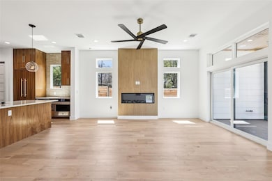 Unfurnished living room with recessed lighting, v