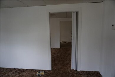 entrance from front room to middle room in Unit B